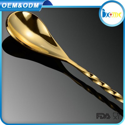 Teardrop gold plated bar spoon with twisted handle